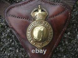 Rare ww1 era household cavalry leather standing martingale with GV brass badge